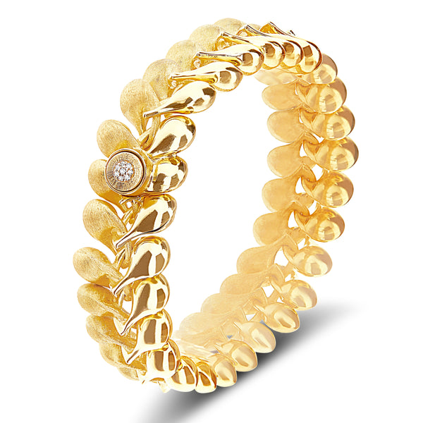 Nanis 18k Yellow Gold "Transformista" Bracelet with Diamonds. Dias=.04tw