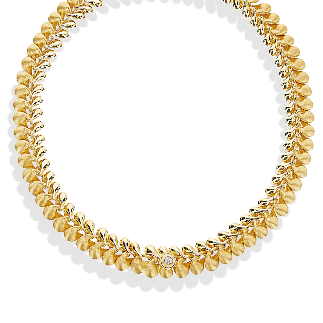 Nanis 18 Karat Yellow Gold 